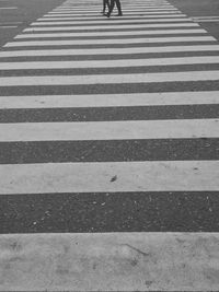 Low section of zebra crossing on road