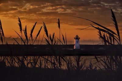 Scenic view of sunset over lake