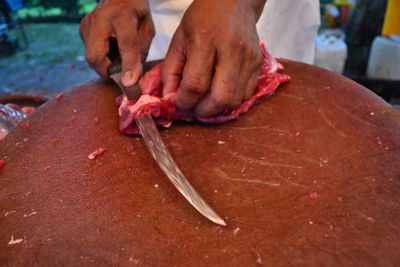 Close-up of man preparing food