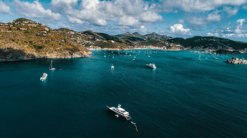 High angle view of sailboat in sea against sky