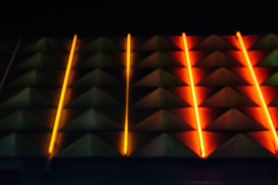 Close-up of illuminated lights at night