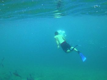 Man swimming in sea