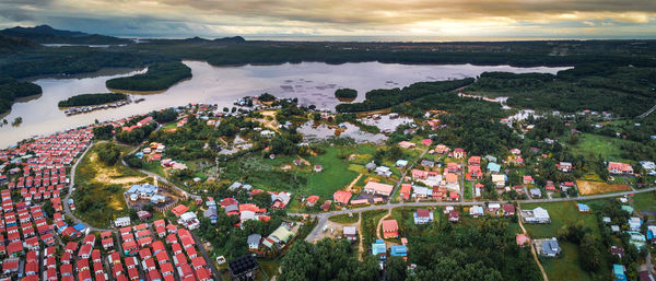 High angle view of trees and buildings against sky