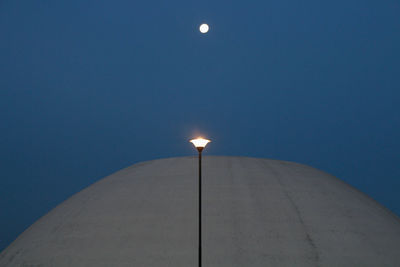 Low angle view of illuminated street light