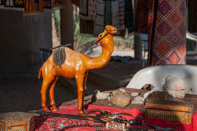 Statue of animal on table