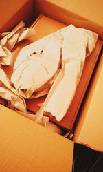 Close-up of paper in box