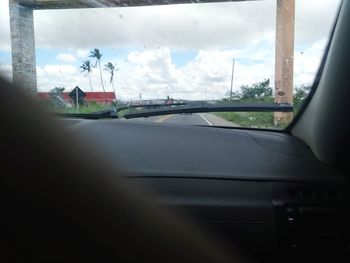 Road seen through car window