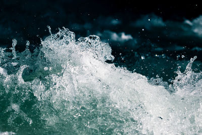 Close-up of wave splashing on sea