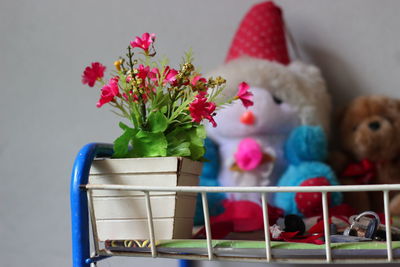 Close-up of red toy car on table
