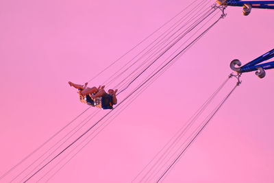 Low angle view of airshow against sky