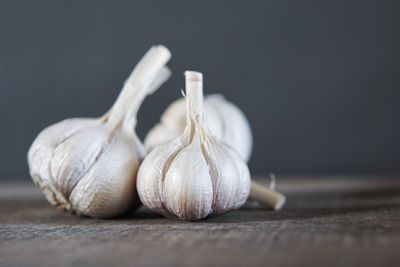 Close-up of garlic on table