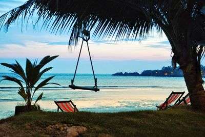 Scenic view of swimming pool at beach against sky