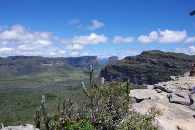 Scenic view of landscape against cloudy sky