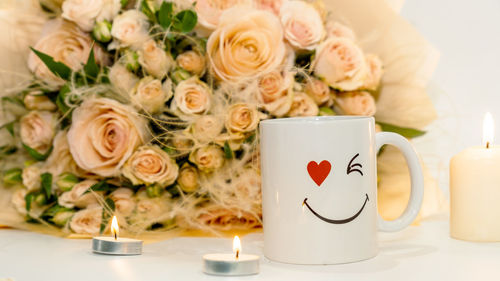 Close-up of roses on table