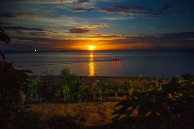 Scenic view of sea at sunset