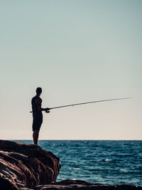 Man fishing silhouette