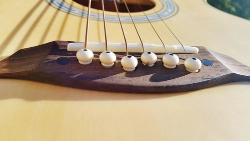 High angle view of guitar on table