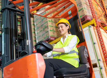 Portrait of smiling man working at bus