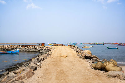 Pier over sea against sky