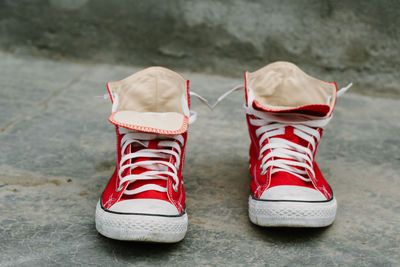 Close-up of shoes on floor