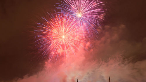 Low angle view of firework display