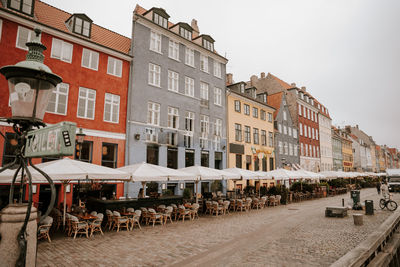 People walking on street in city