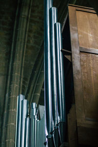 Low angle view of pipes in building