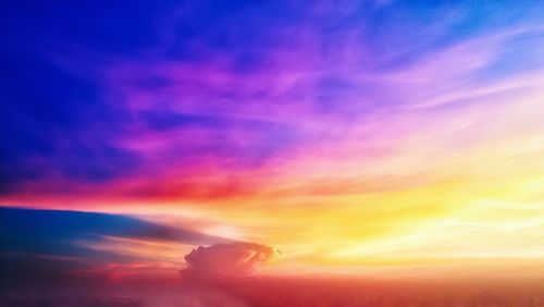 Low angle view of dramatic sky during sunset