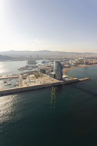 Spain, catalonia, barcelona, helicopter view of city coastline and marina