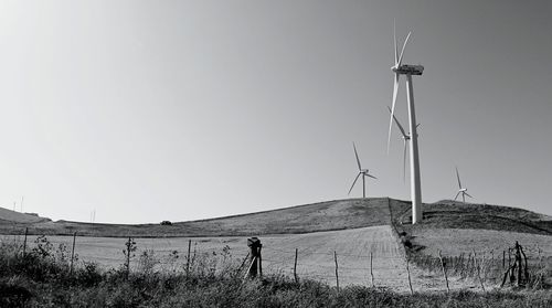 Wind turbines on field