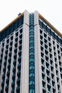 Low angle view of skyscraper against clear sky