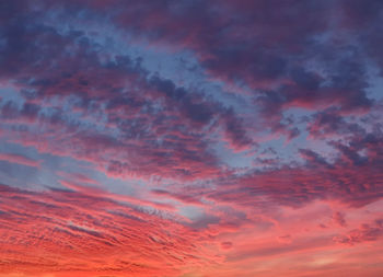 Low angle view of dramatic sky during sunset