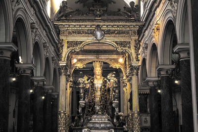 Low angle view of illuminated historic building at night