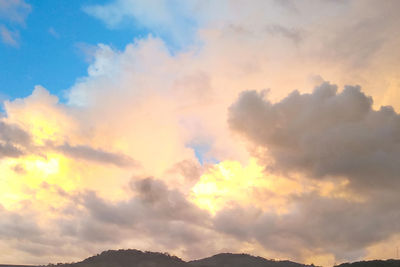 Low angle view of dramatic sky during sunset