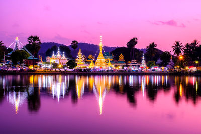 Wat chong kham is a buddhist temple with reflection in the lake at mae hong son,thailand.