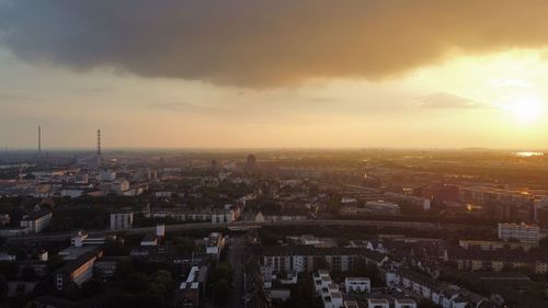 High angle view of townscape against sky during sunset