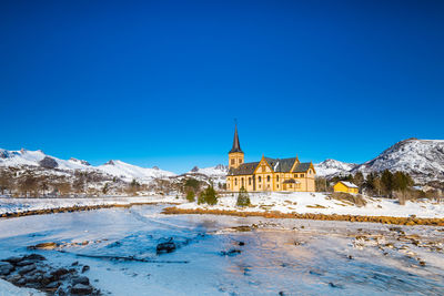 Building against blue sky during winter