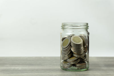 Close-up of coins on table