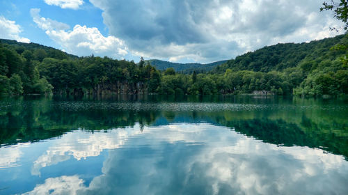 Scenic view of lgalovac ake and mountains against sky