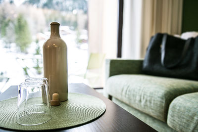 Close-up of sofa on table at home