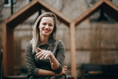 Young beautiful woman with long hair enjoying springtime.