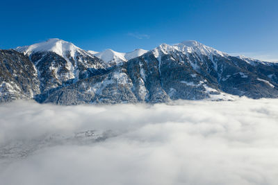 Aerial panoramic view of winter wonderland in the gastein valley, salzburg, austria.