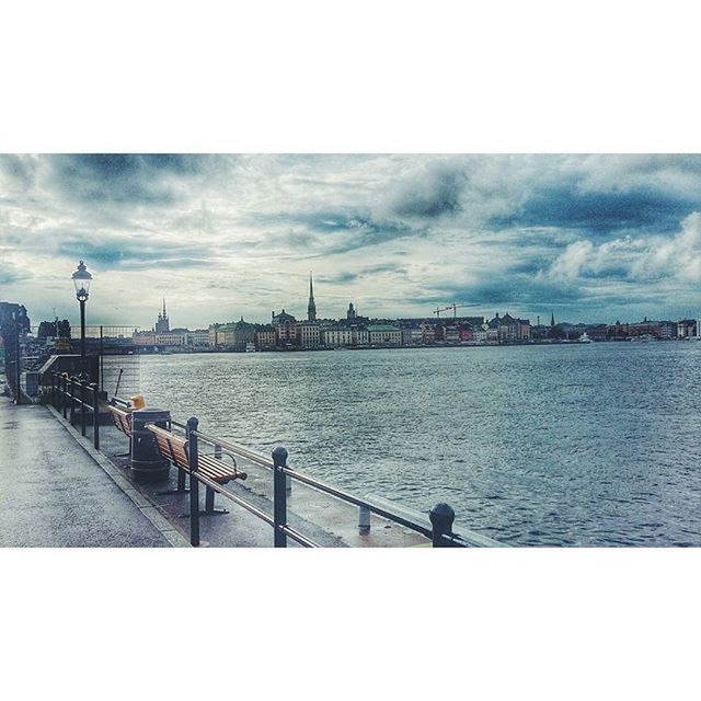 water, sky, architecture, built structure, cloud - sky, building exterior, sea, river, cloudy, transportation, city, nautical vessel, harbor, transfer print, railing, auto post production filter, waterfront, pier, cloud, overcast