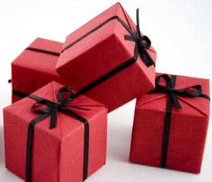 Close-up of christmas presents against white background