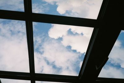 Low angle view of sky seen through window