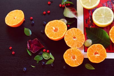 High angle view of orange fruits on table