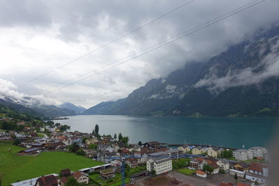 Scenic view of town against sky