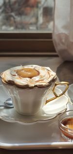 Close-up of coffee served on table