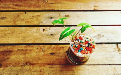 Close-up of multi colored jar on table