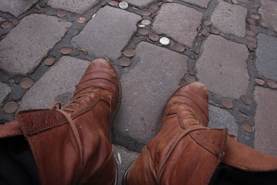 Low section of man standing on floor